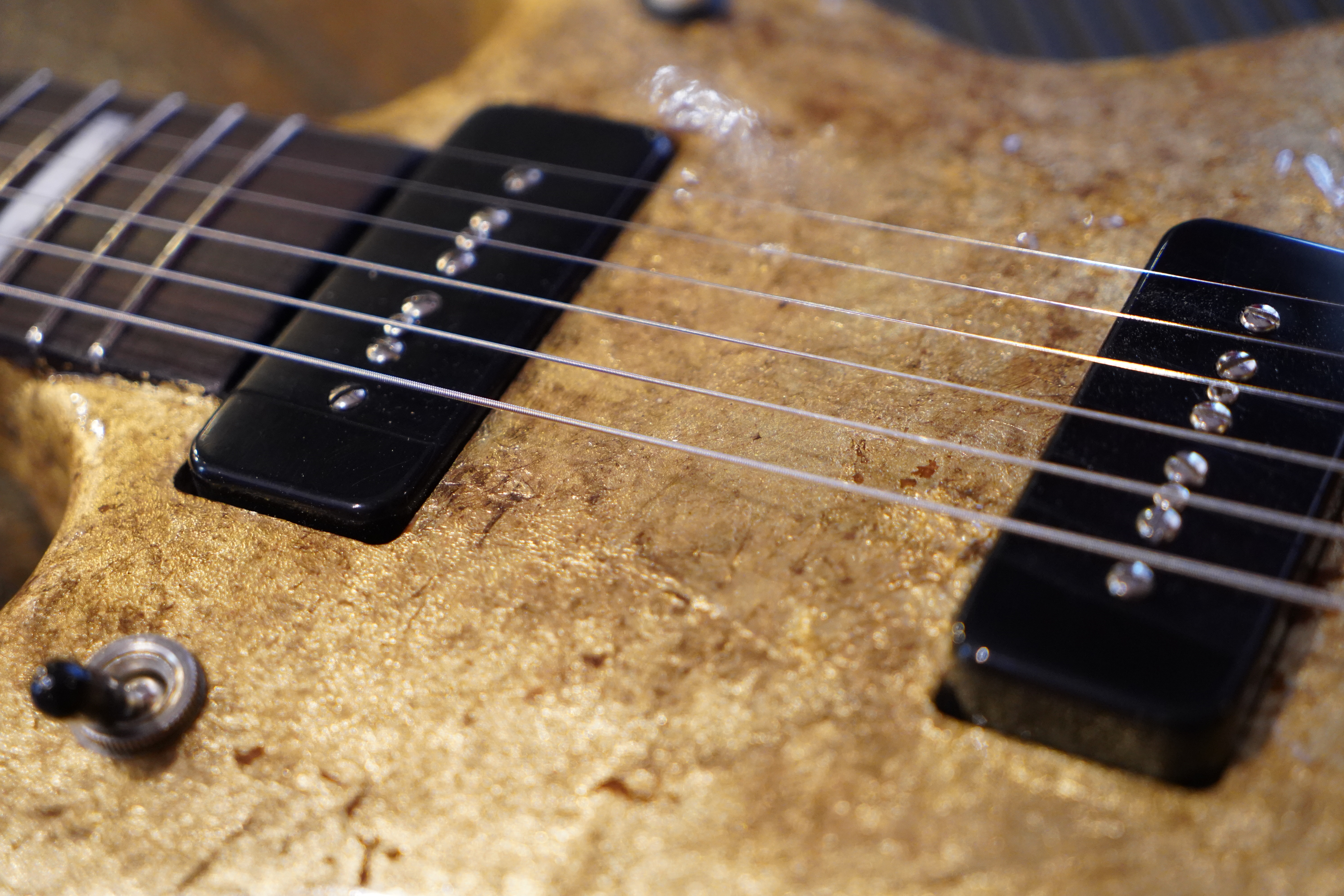 Gold leaf guitar finish